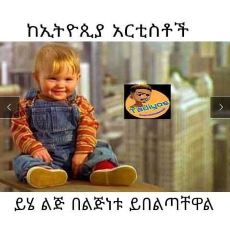 a child sitting on top of a building